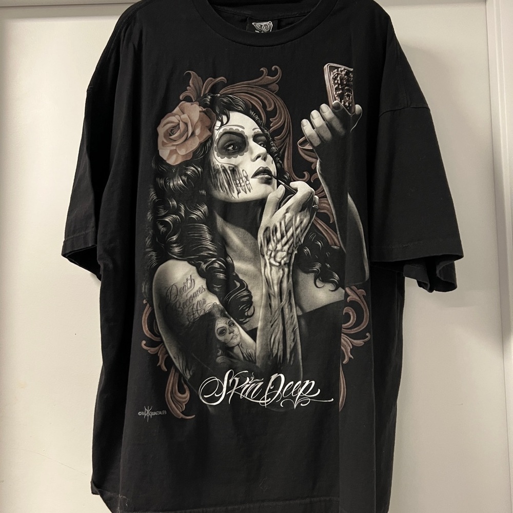DGA Tee’s size 4X, black graphic tee